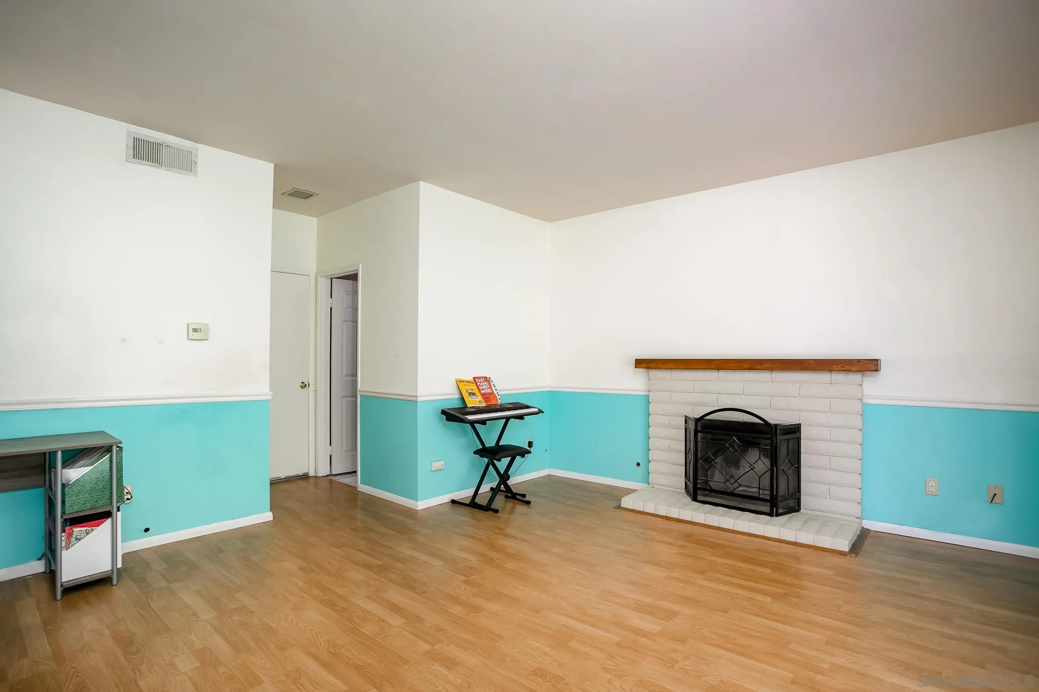 9229 Birchcrest Boulevard Santee, CA 92071 - Photo 17 of 39 a view of livingroom with furniture and a fireplace