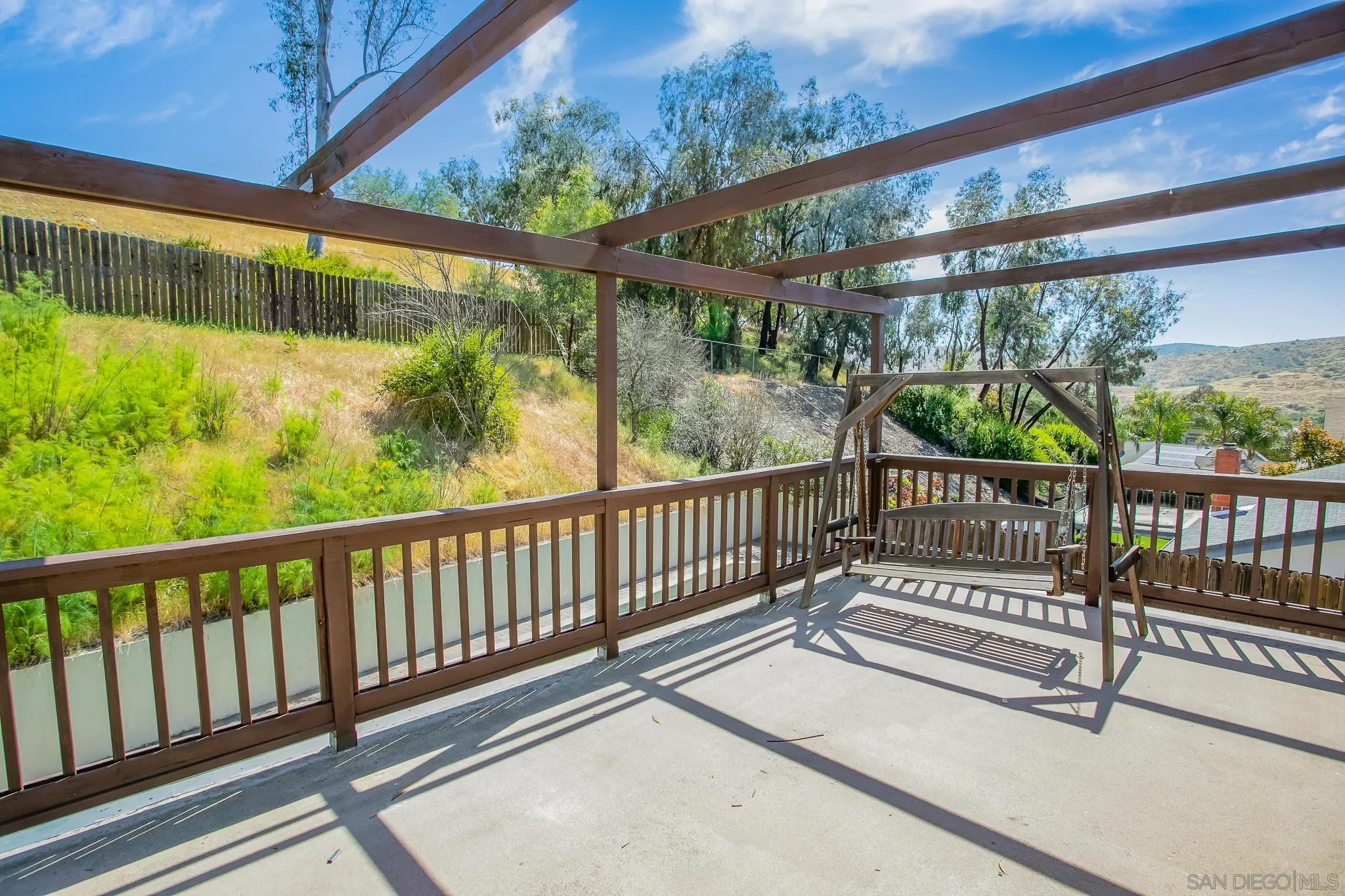 9229 Birchcrest Boulevard Santee, CA 92071 - Photo 19 of 39 a view of a two chairs in the balcony