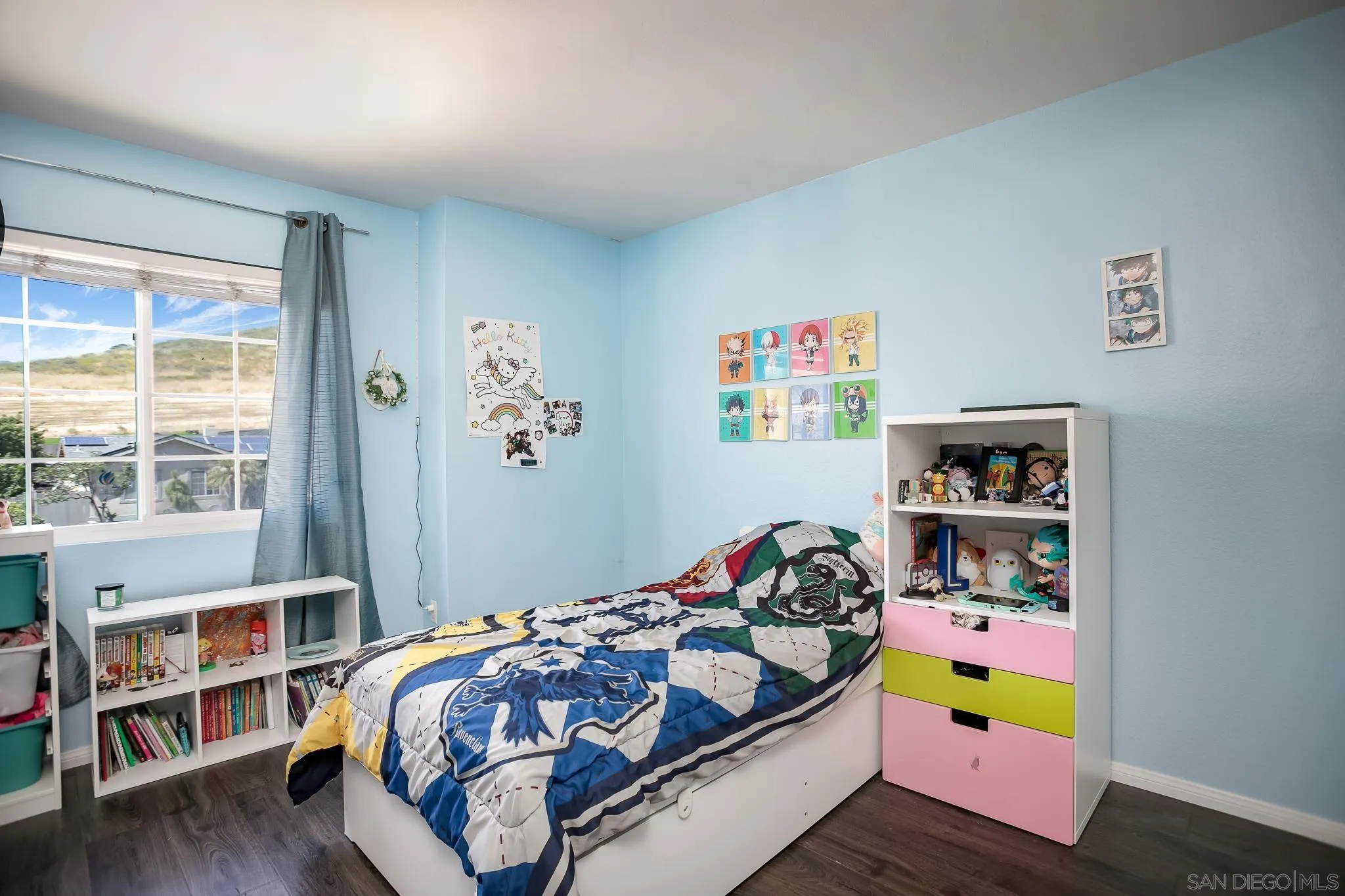 9229 Birchcrest Boulevard Santee, CA 92071 - Photo 28 of 39 a bedroom with a bed and a window