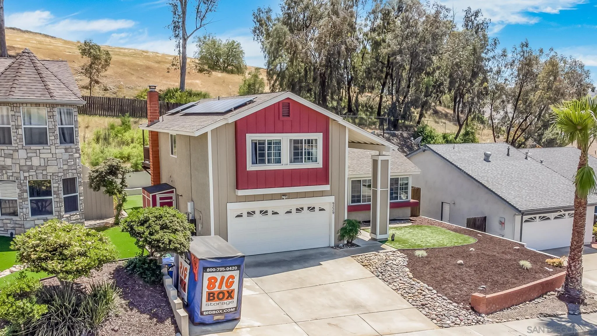 9229 Birchcrest Boulevard Santee, CA 92071 - Photo 4 of 39 a front view of a house with garden