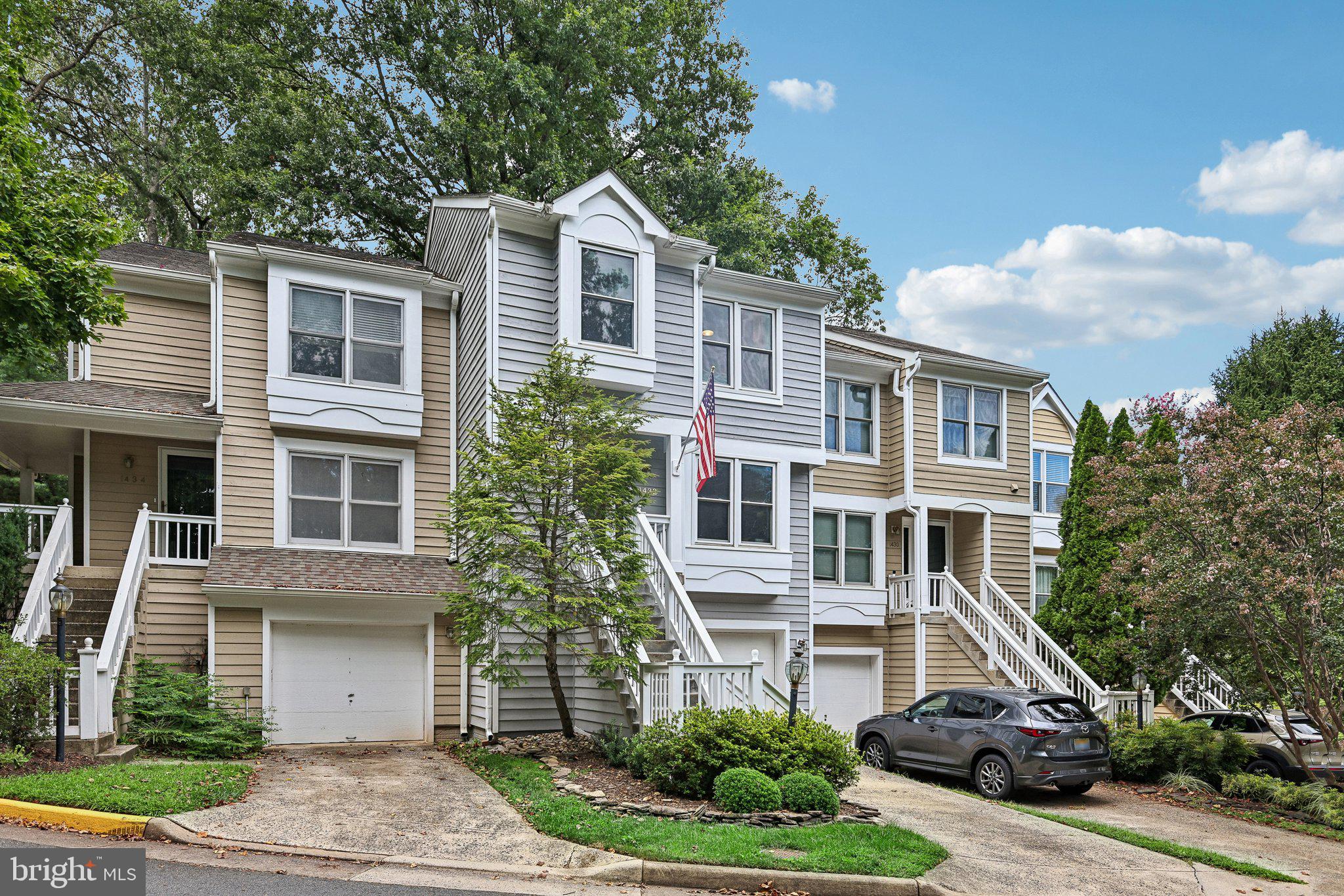 1432 Newport Spring Court Reston, VA 20194 - Photo 3 of 42 Charming backyard with rustic appeal.