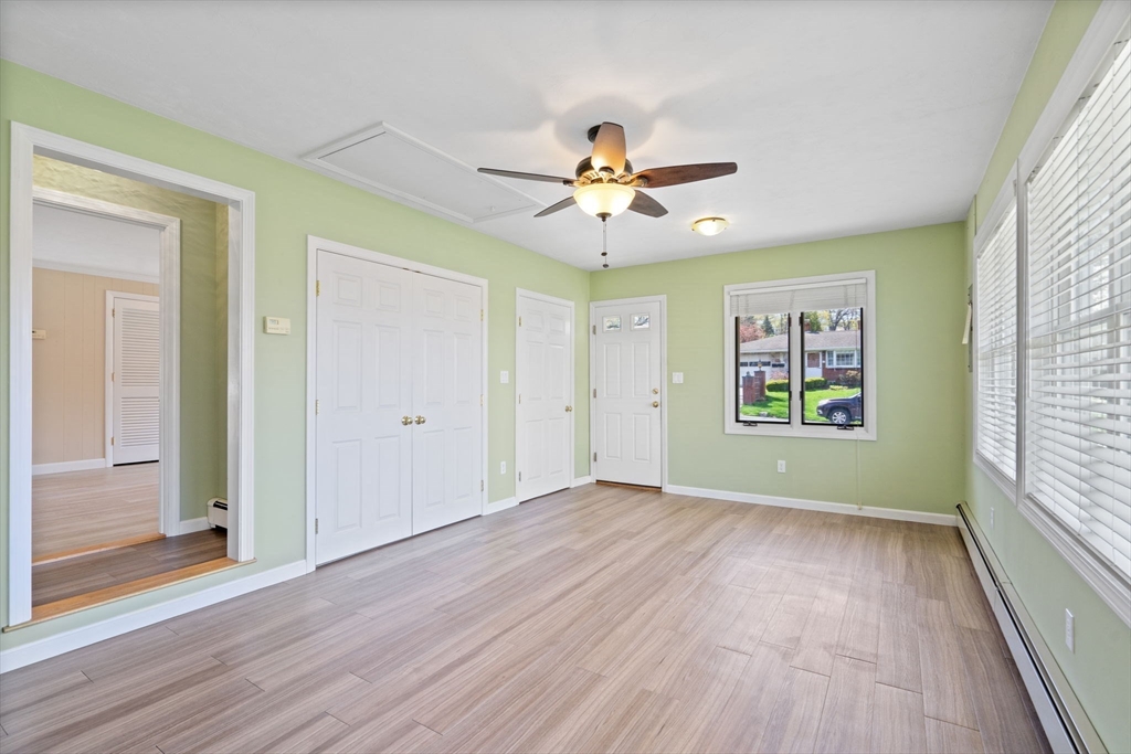 3 Ruth Drive Framingham, MA 01701 - Photo 14 of 35 wooden floor in an empty room with a window
