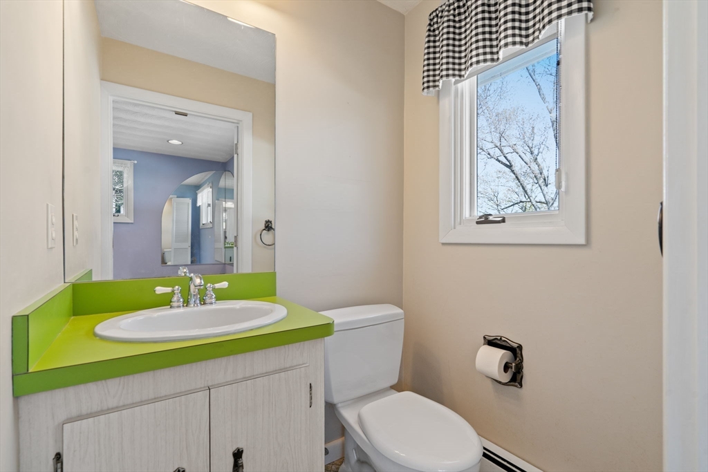 3 Ruth Drive Framingham, MA 01701 - Photo 17 of 35 a bathroom with a sink a mirror and a toilet