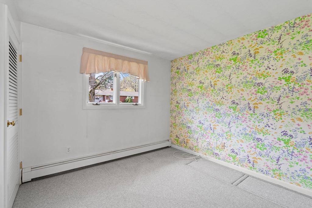 3 Ruth Drive Framingham, MA 01701 - Photo 20 of 35 a view of an empty room and window