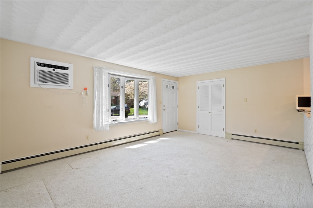 3 Ruth Drive Framingham, MA 01701 - Photo 9 of 35 a view of an empty room with a window