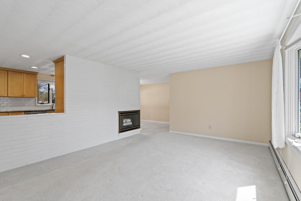 3 Ruth Drive Framingham, MA 01701 - Photo 10 of 35 a view of an empty room with a window