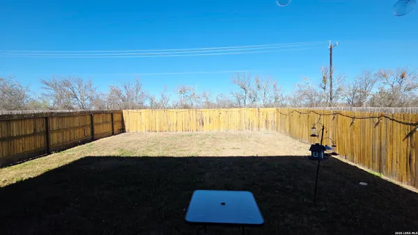 a view of a room with a tree