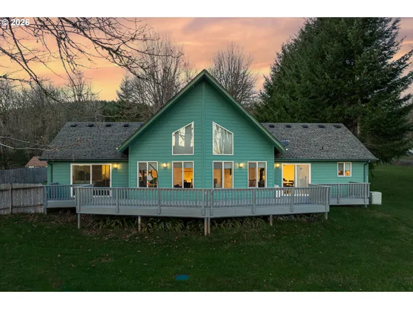 a view of front of house with a yard