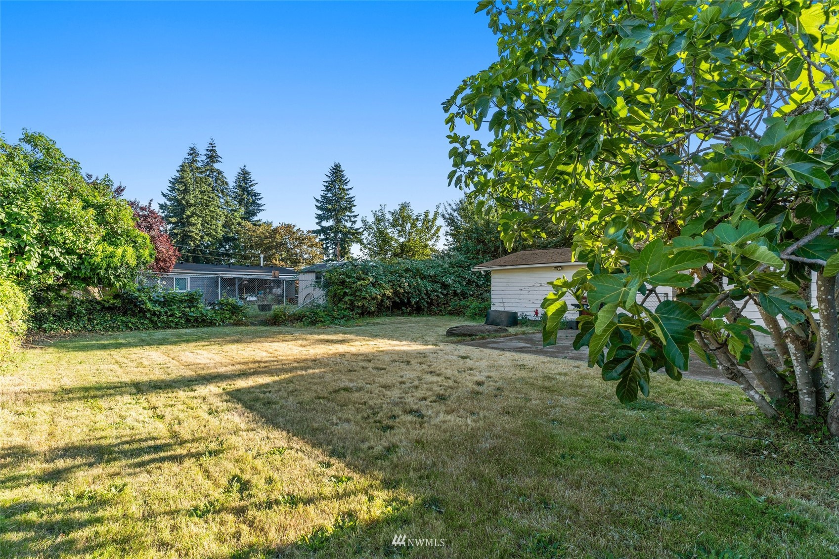 2309 Northeast 9th Street Renton, WA 98056 - Photo 21 of 22 a house view with a backyard space