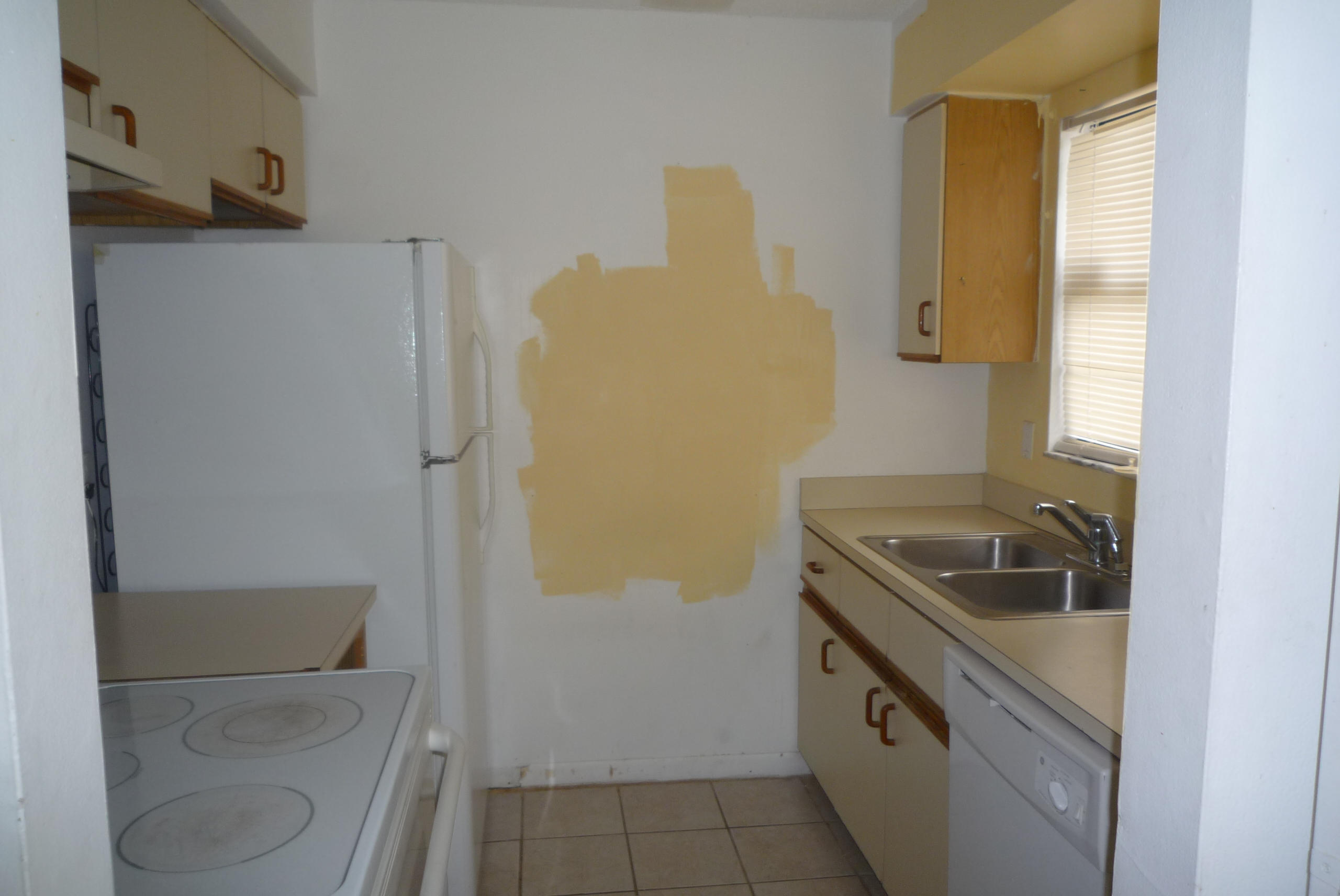 4203 Inlet Circle Greenacres, FL 33463 - Photo 4 of 9 a bathroom with a sink a toilet and shower