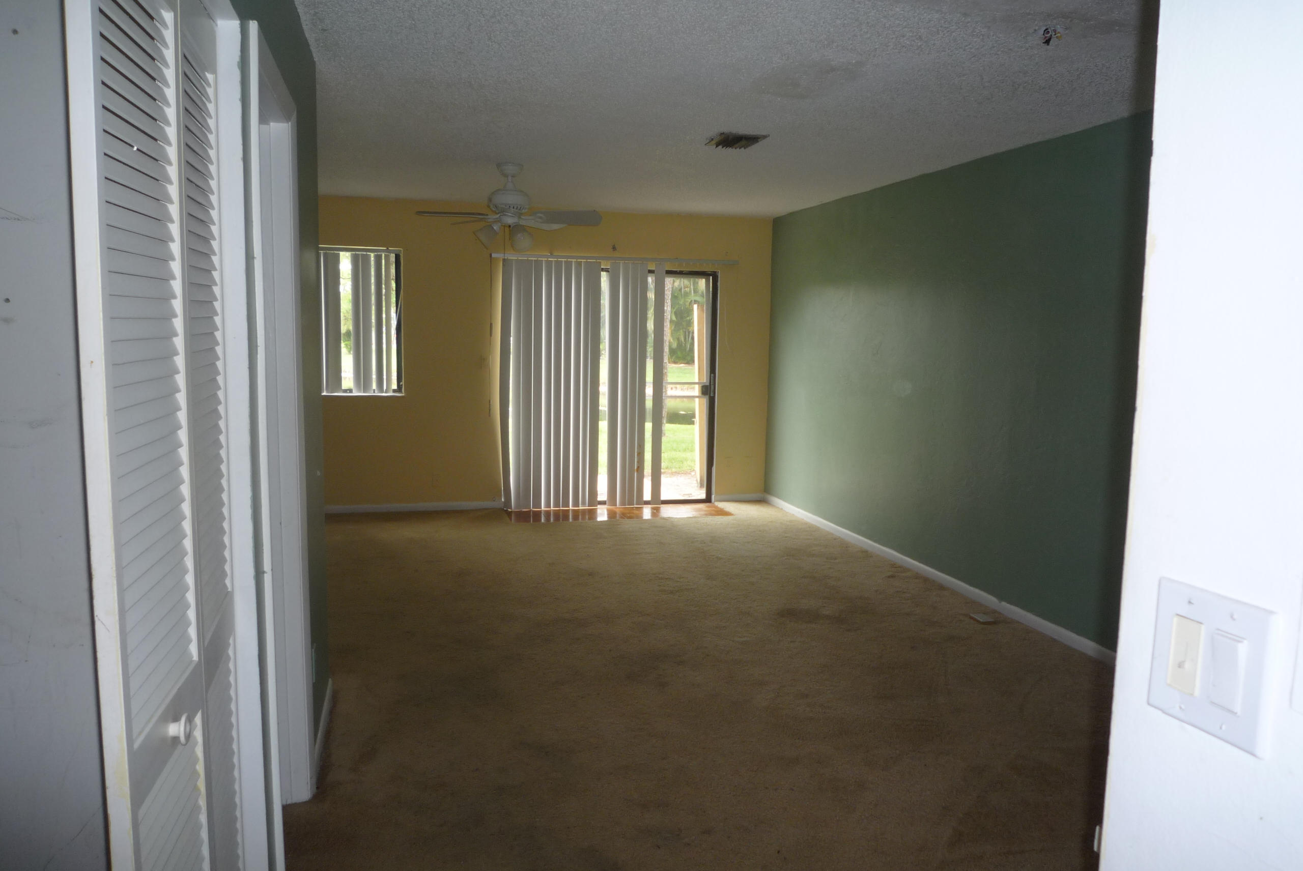 4203 Inlet Circle Greenacres, FL 33463 - Photo 5 of 9 a view of empty room with windows