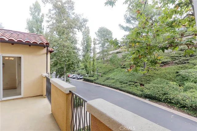 a view of a balcony with an outdoor space