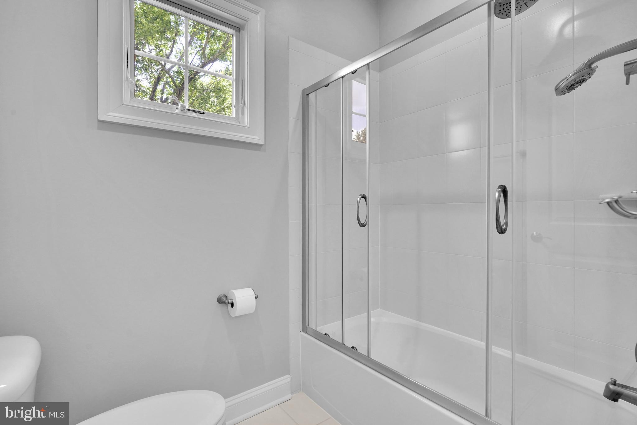 421 Cynthia Lane Northeast Vienna, VA 22180 - Photo 35 of 67 Shared bath with glass shower doors