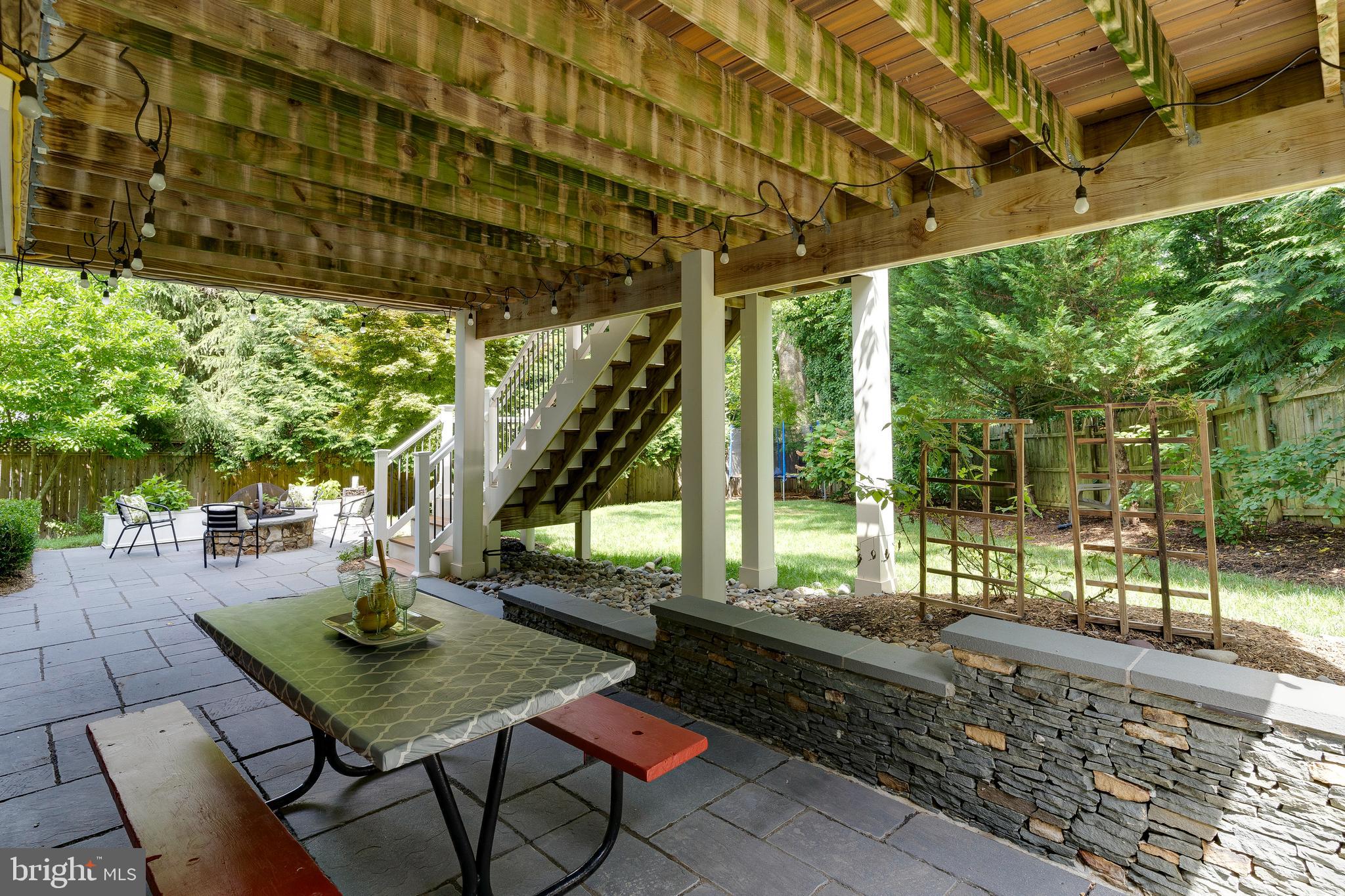 421 Cynthia Lane Northeast Vienna, VA 22180 - Photo 57 of 67 Stone patio under deck