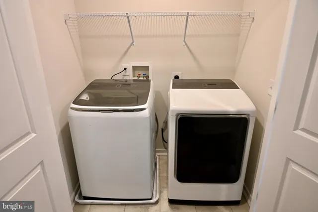 a view of a balcony with chairs