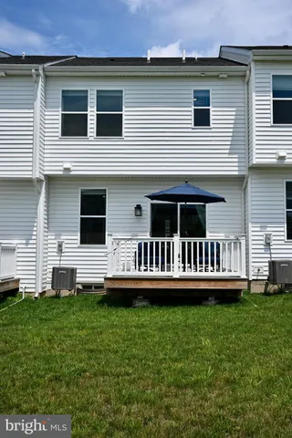 a view of front door with wooden floor