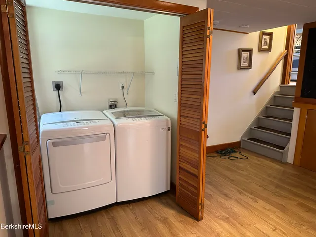 a utility room with dryer and washer