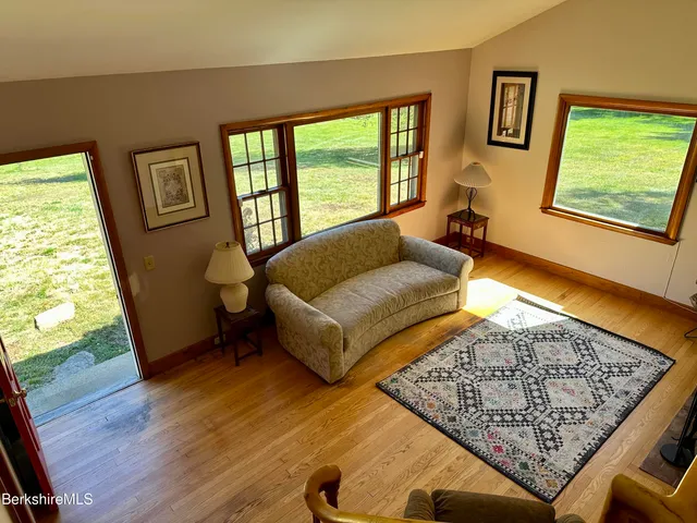 a living room with couch and a window