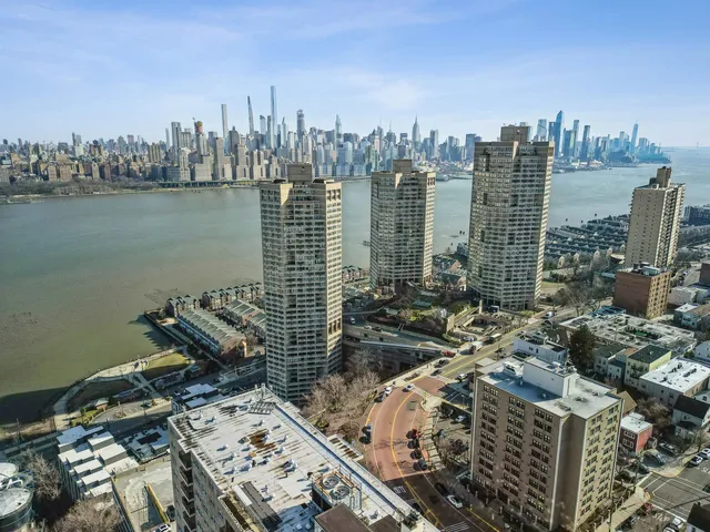 a view of a city with tall buildings