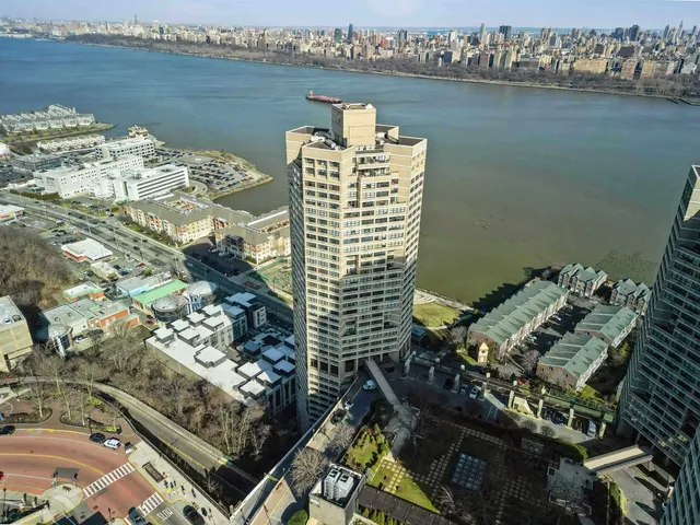 a view of a city and ocean view