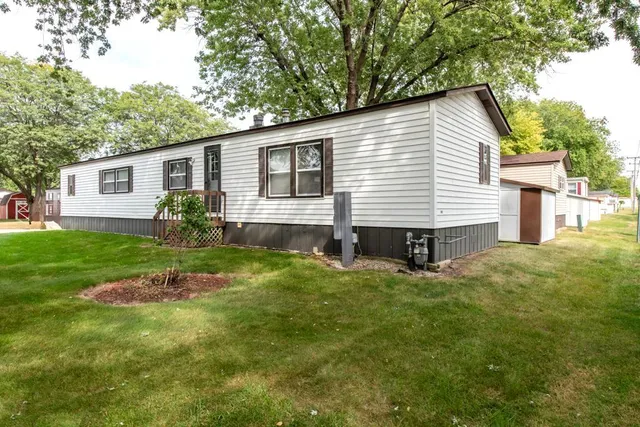 a backyard of a house with seating space