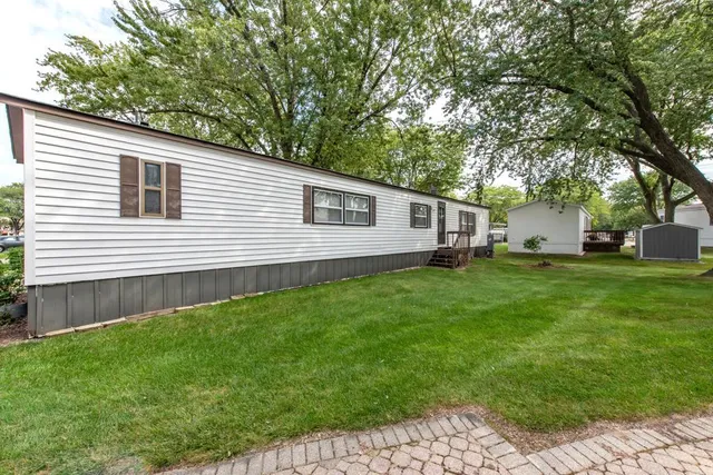 a house view with a backyard space