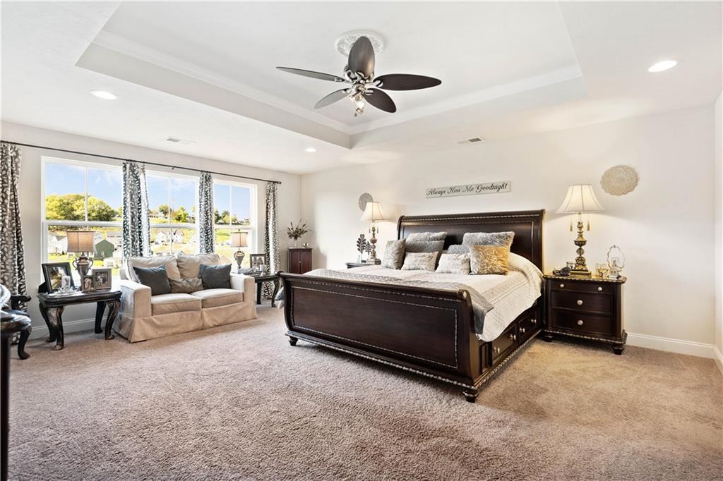 7660 Dominick Drive Irwin, PA 15642 - Photo 12 of 25 a bedroom with a bed and ceiling fan