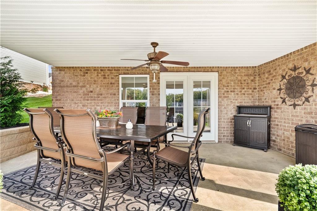 7660 Dominick Drive Irwin, PA 15642 - Photo 22 of 25 a view of a patio with table and chairs and potted plants
