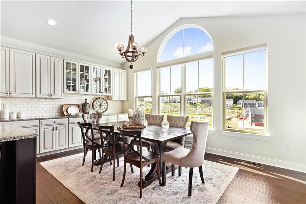 7660 Dominick Drive Irwin, PA 15642 - Photo 6 of 25 a view of a dining room with furniture window and outside view