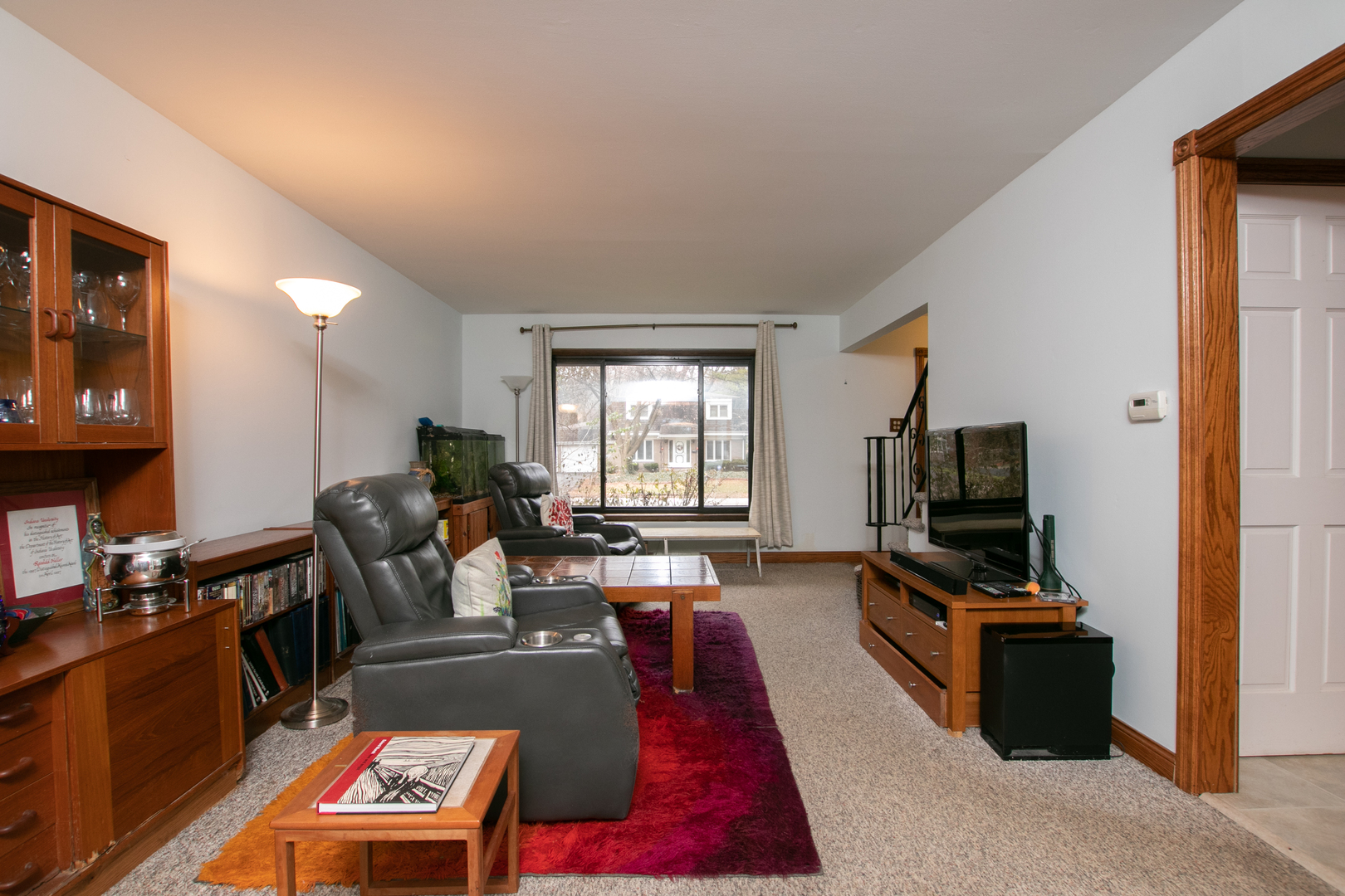 1325 Linden Road Homewood, IL 60430 - Photo 4 of 19 a living room with furniture fireplace and a flat screen tv