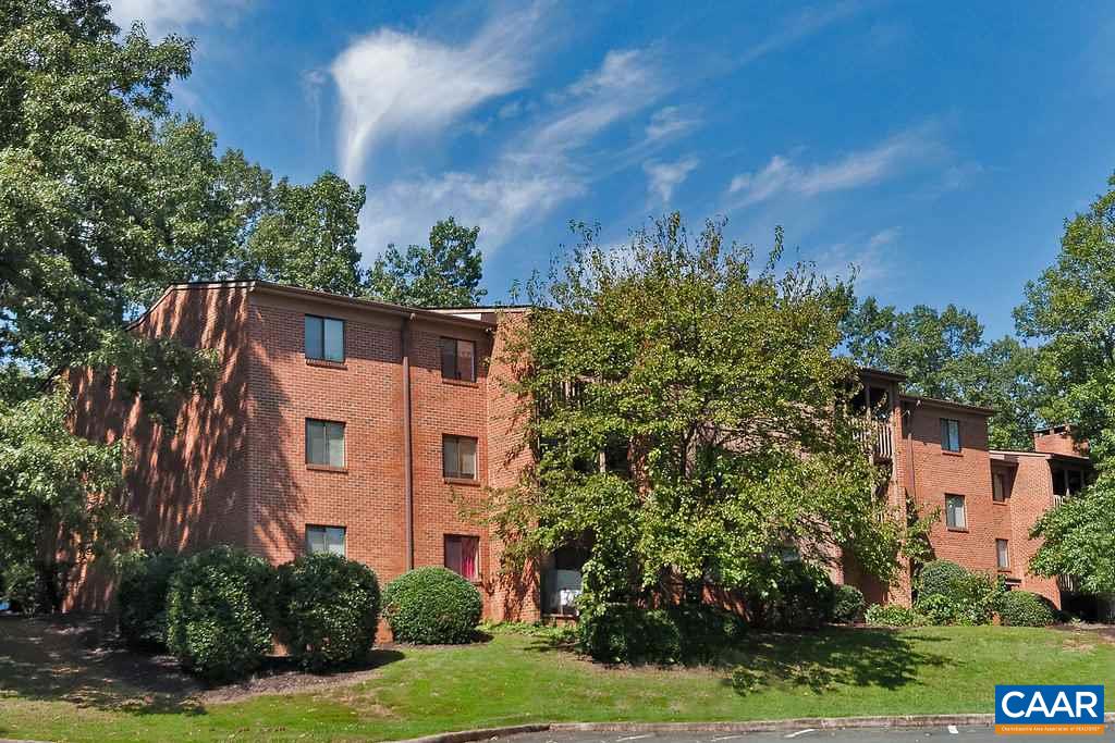 101 Turtle Creek Road, Unit 12 Charlottesville, VA 22901 - Photo 27 of 36 a view of a building with a yard