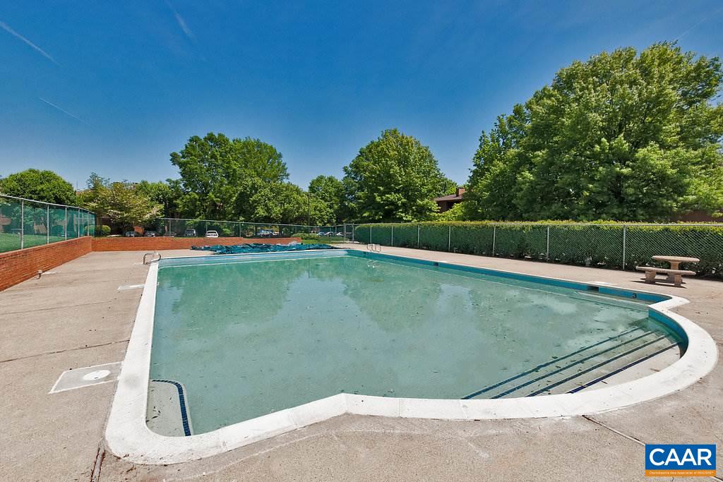 101 Turtle Creek Road, Unit 12 Charlottesville, VA 22901 - Photo 31 of 36 a view of a swimming pool with a yard