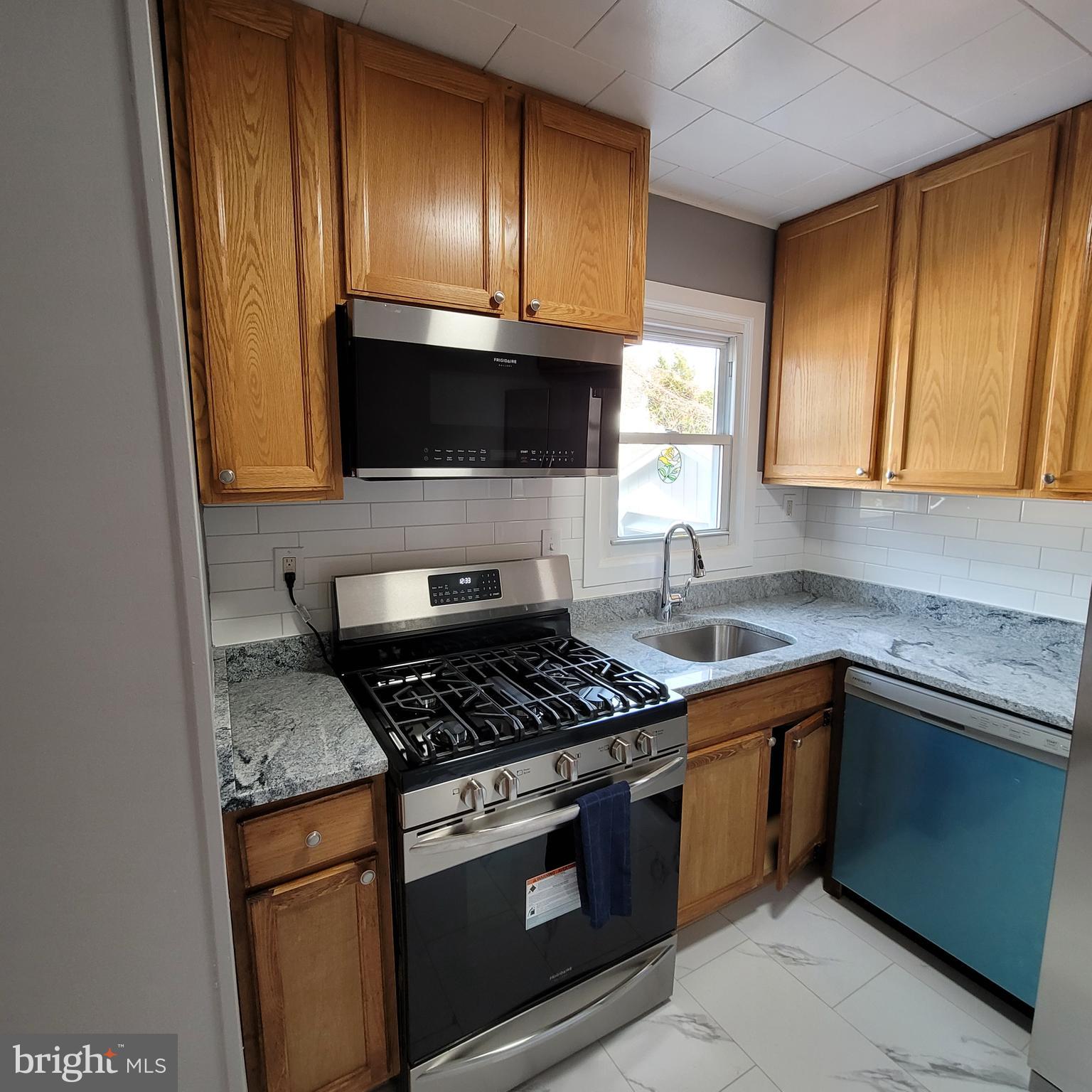 4126 Moravia Road Baltimore, MD 21206 - Photo 15 of 30 Kitchen features large gas range