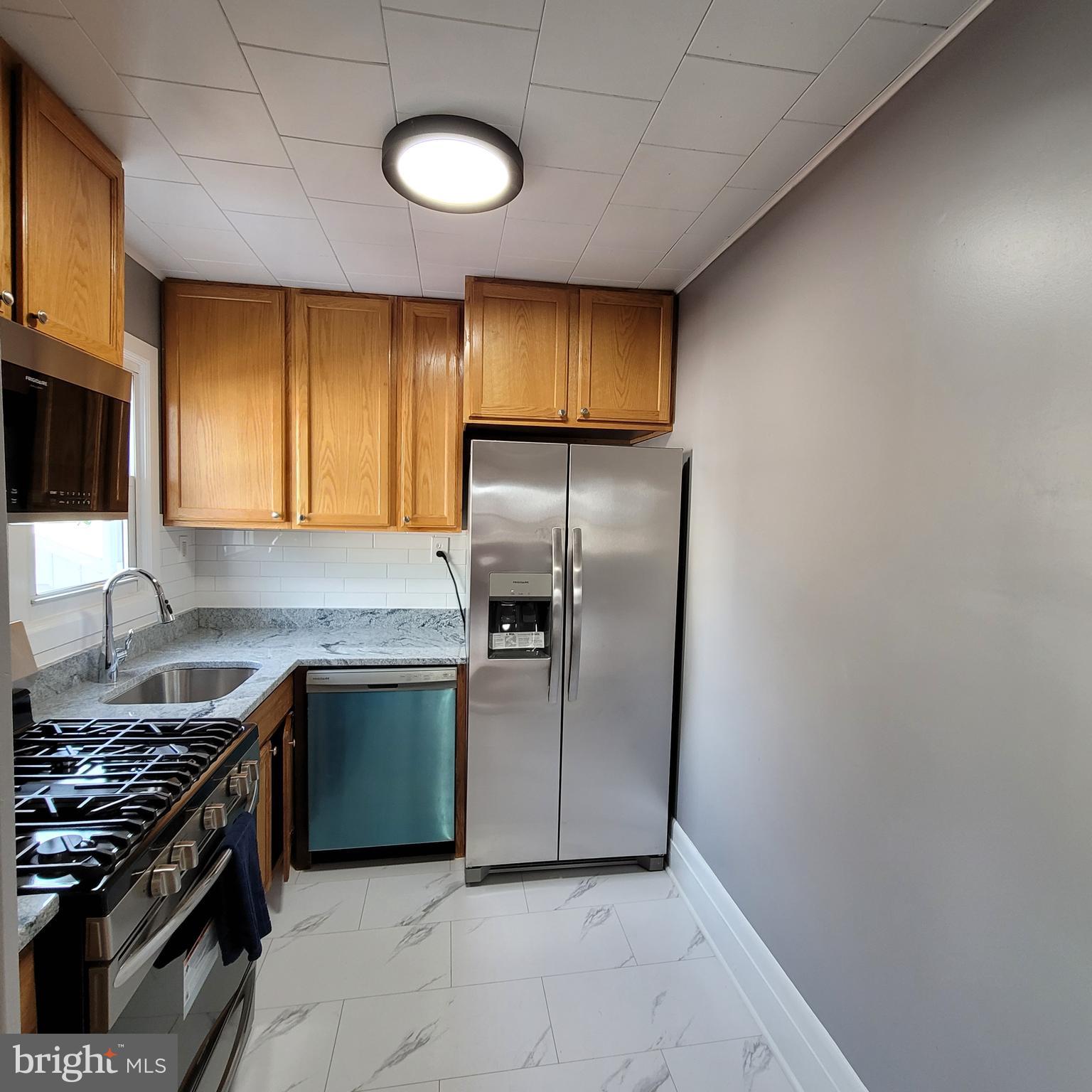 4126 Moravia Road Baltimore, MD 21206 - Photo 16 of 30 Family sized fridge