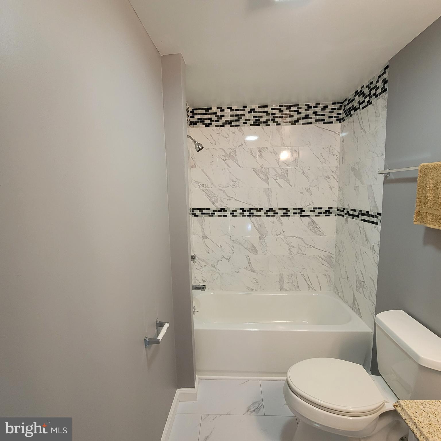 4126 Moravia Road Baltimore, MD 21206 - Photo 19 of 30 Full bath on main floor
Custom tile
