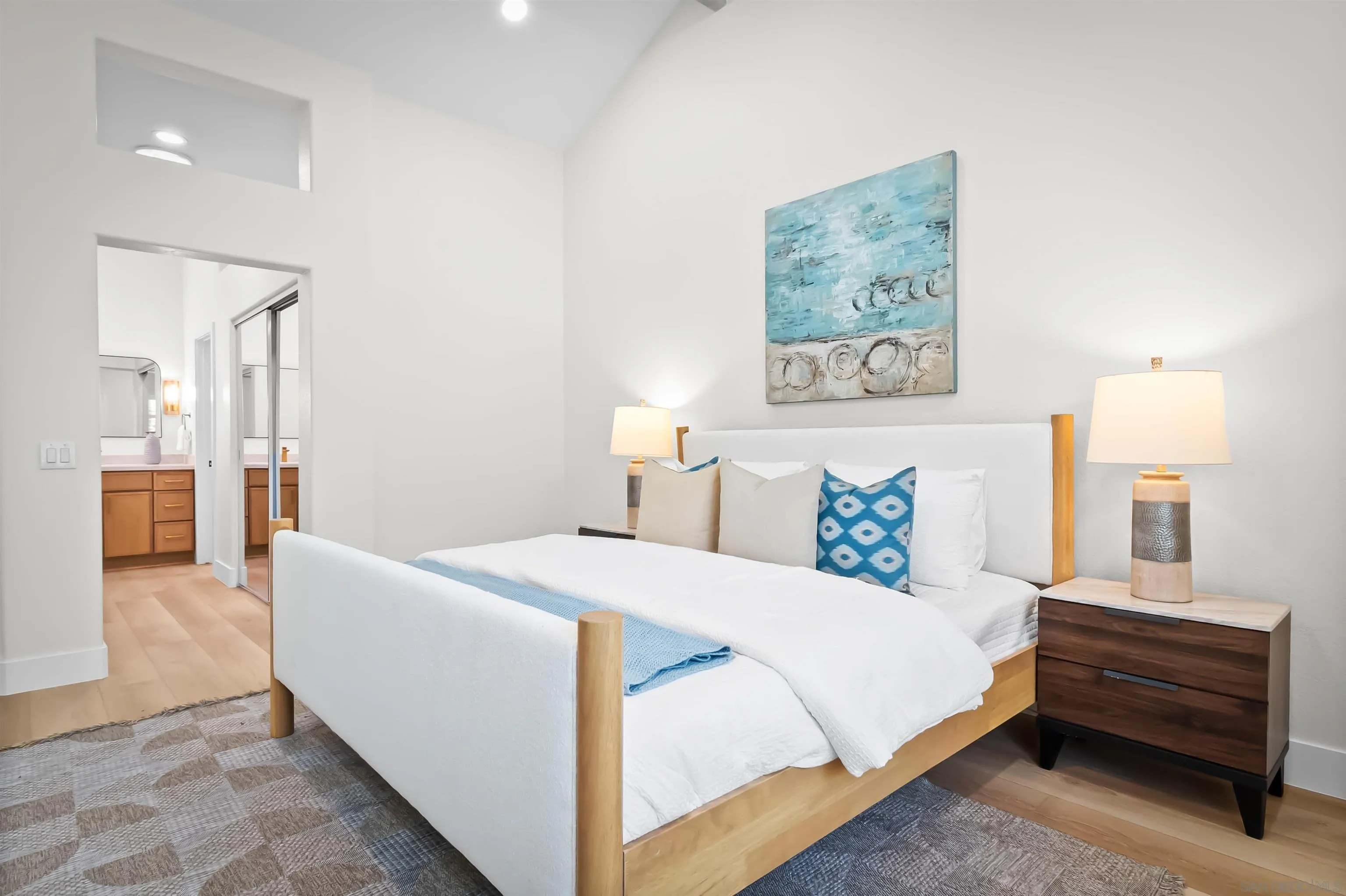 4058 Lemnos Way Oceanside, CA 92056 - Photo 20 of 47 a bedroom with a bed and a couch