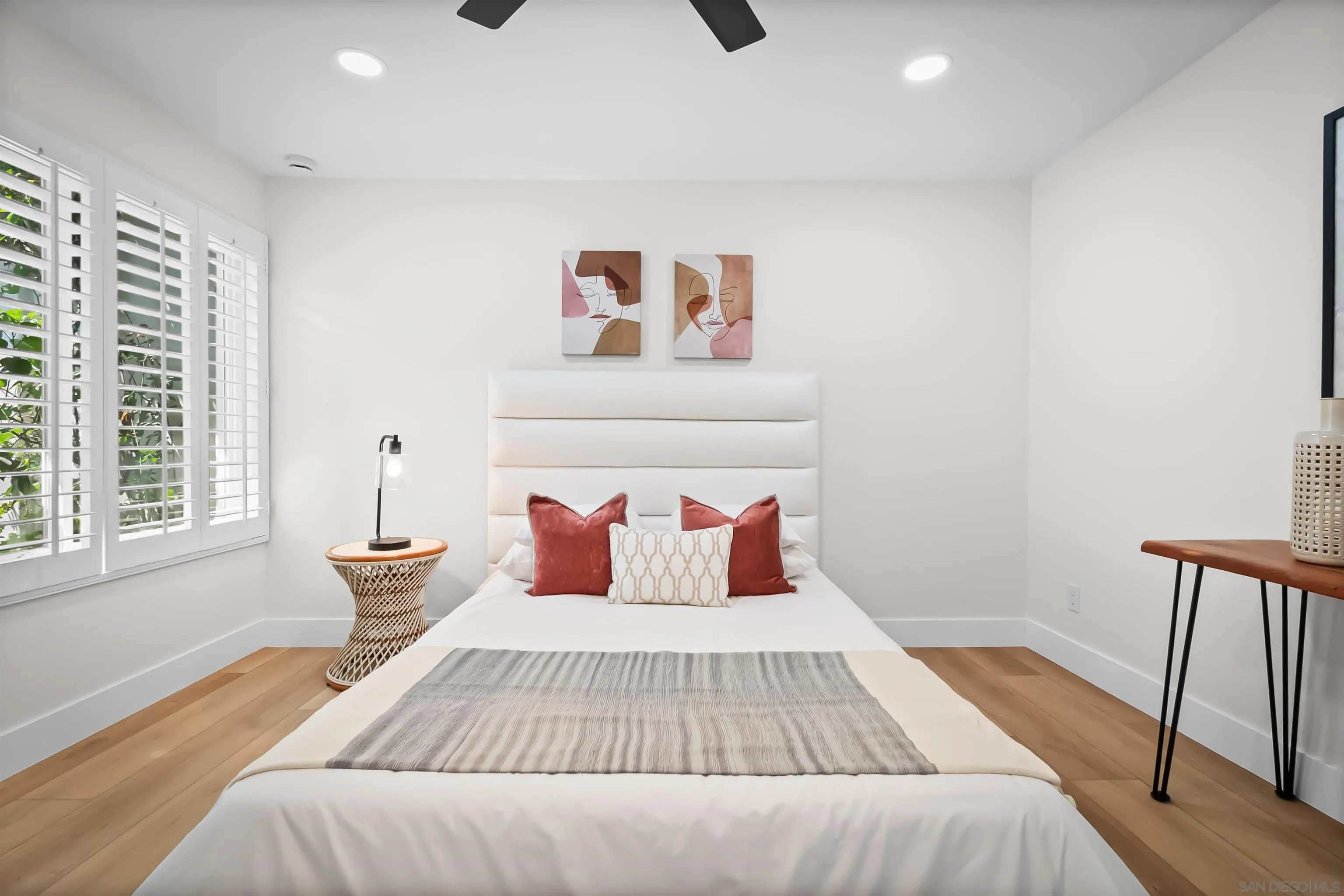 4058 Lemnos Way Oceanside, CA 92056 - Photo 28 of 47 a bedroom with a bed and window