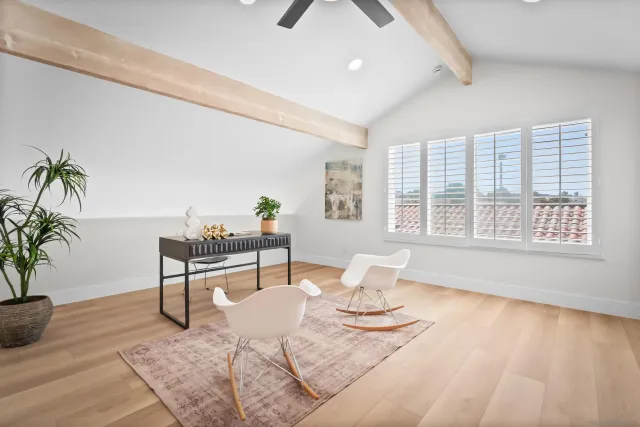 a living room with furniture and window