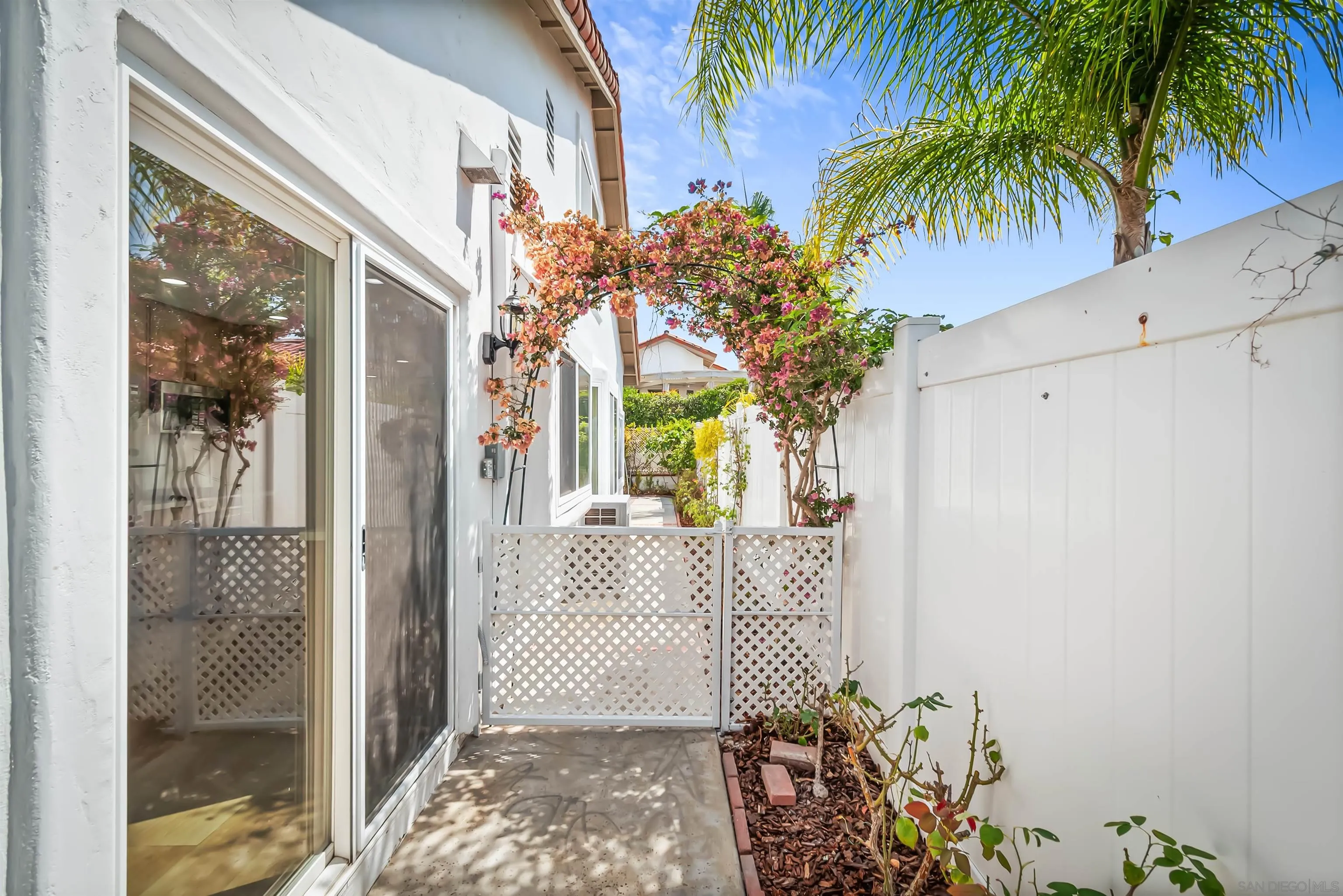 4058 Lemnos Way Oceanside, CA 92056 - Photo 40 of 47 a view of a house with a tree in front