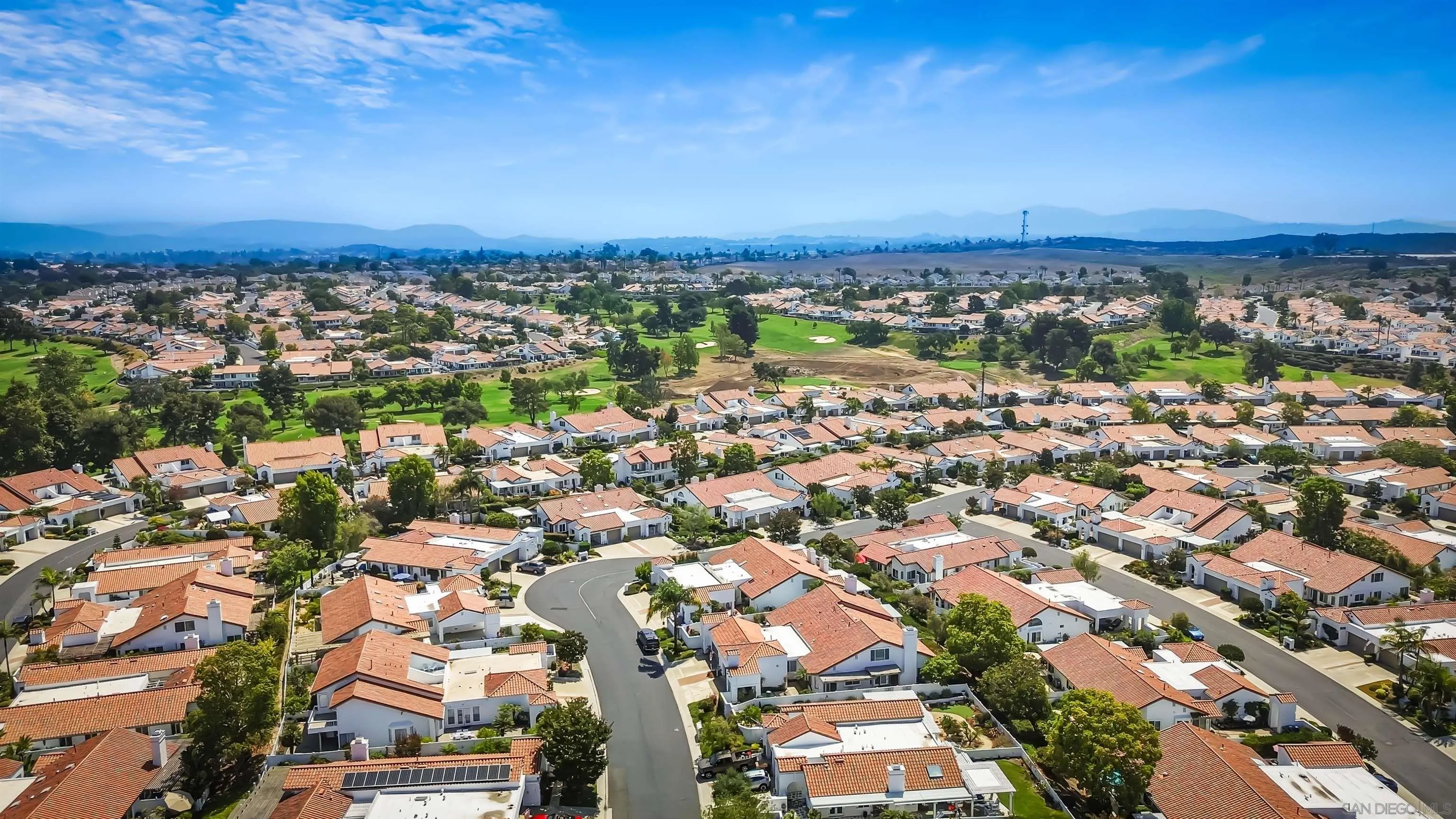 4058 Lemnos Way Oceanside, CA 92056 - Photo 46 of 47 an aerial view of a city with lots of residential buildings