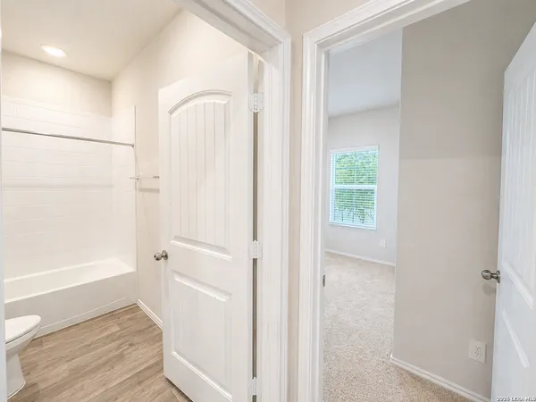 a bathroom with a bathtub