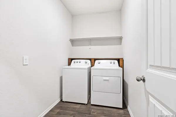 a utility room with dryer and washer