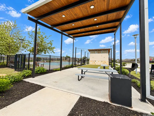 a view of a terrace with outdoor seating