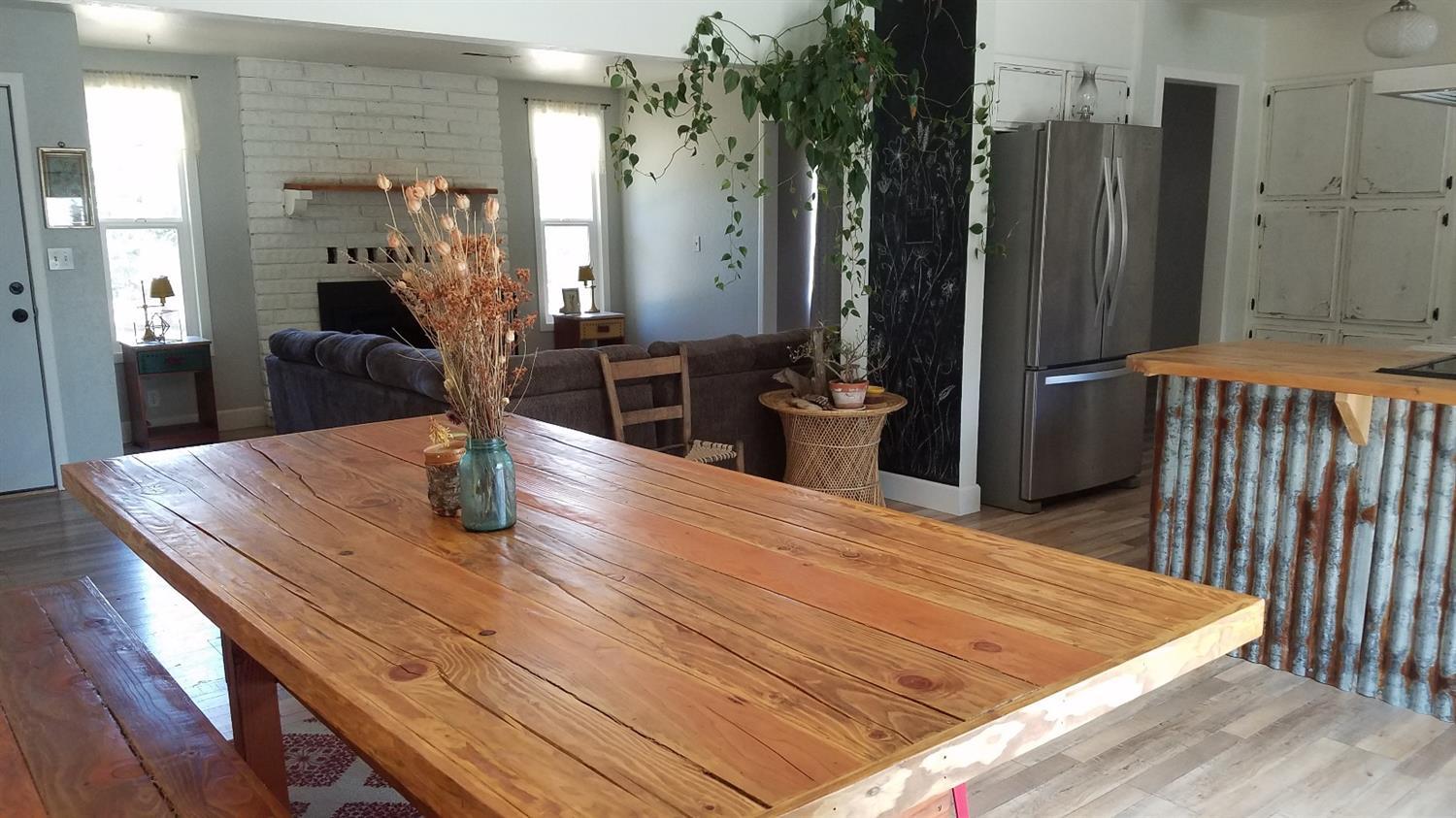 6837 West Side Road Cave Junction, OR 97523 - Photo 8 of 35 Dining area next to kitchen