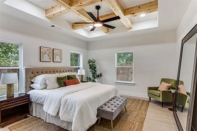 a bathroom with a sink a mirror and a shower