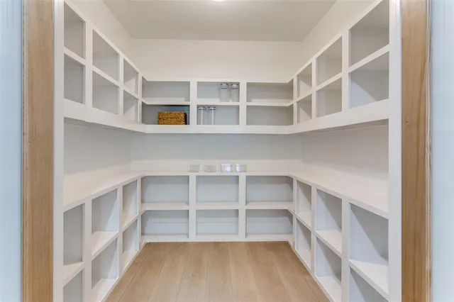 a view of a room with a white walls