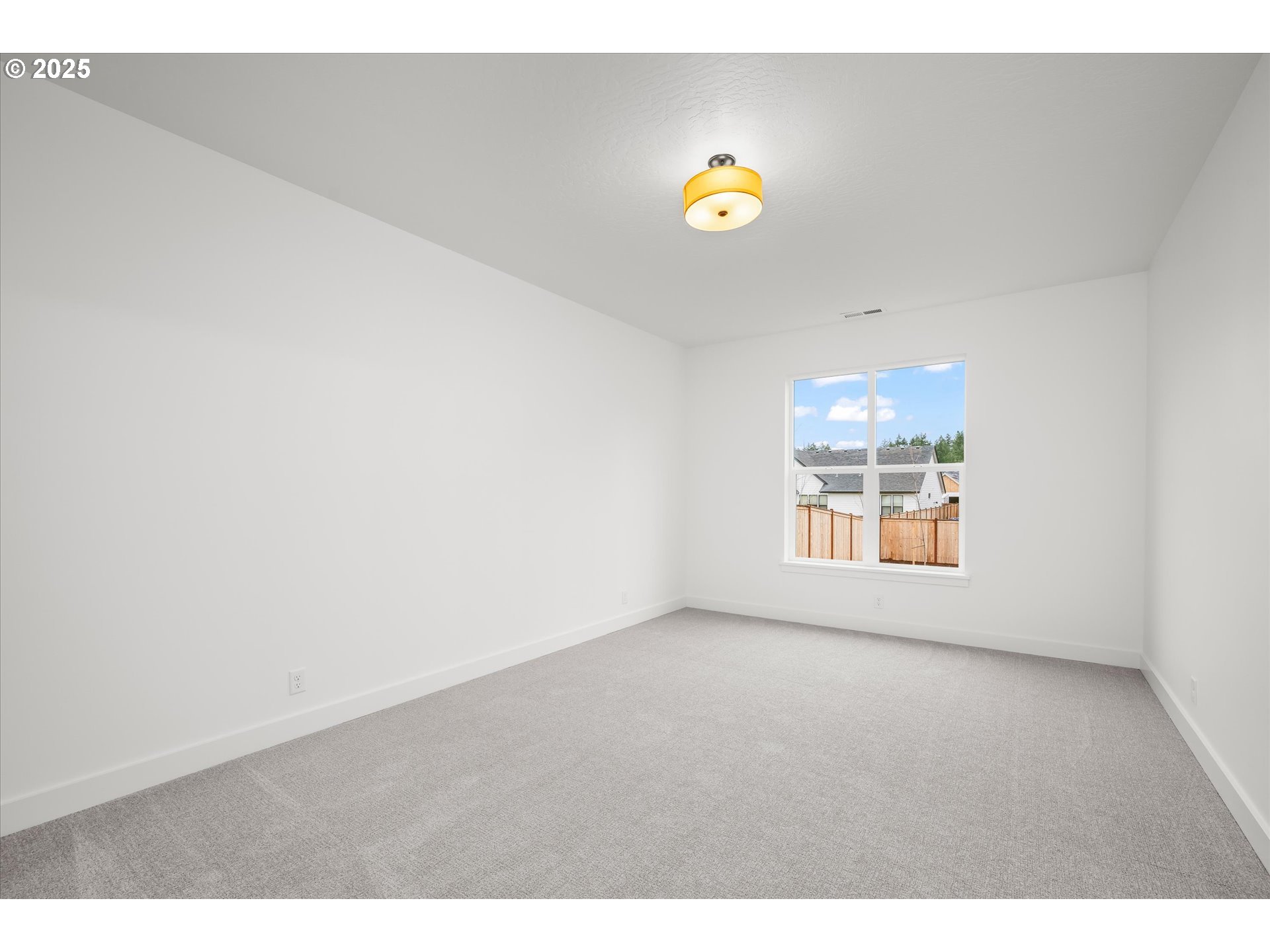 88091 Jameson Way Veneta, OR 97487 - Photo 18 of 22 a view of an empty room with a window