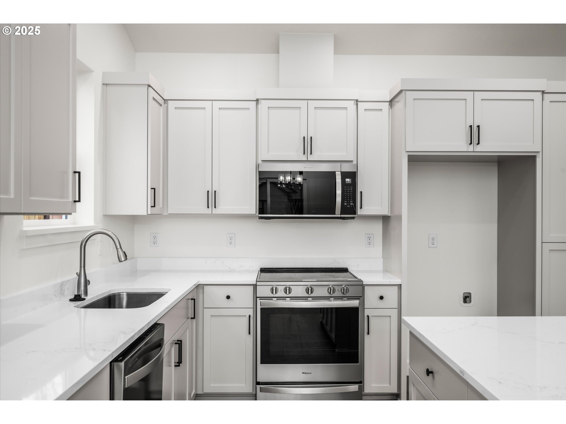 88091 Jameson Way Veneta, OR 97487 - Photo 9 of 22 a kitchen with stainless steel appliances white cabinets and a sink