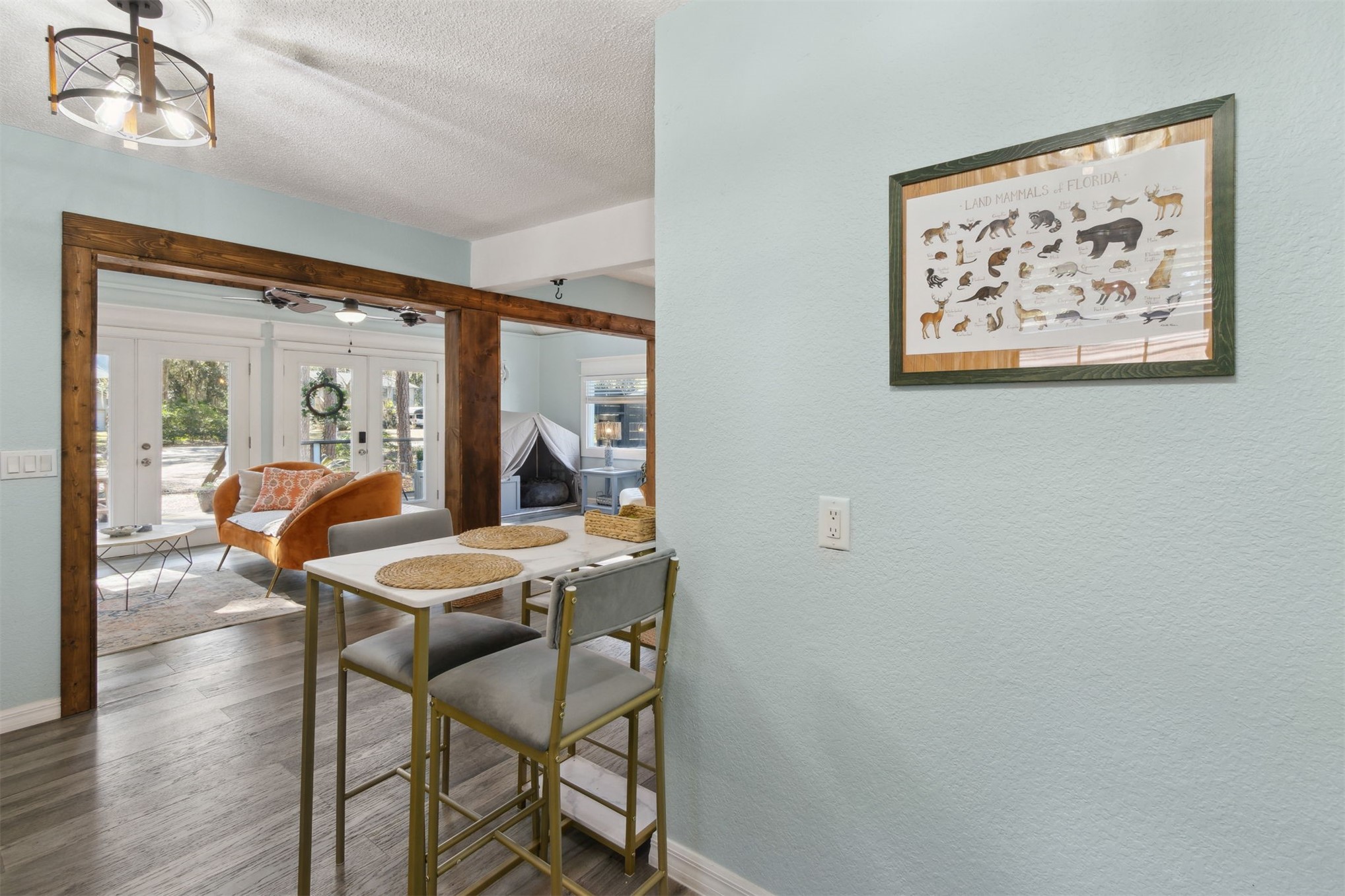 97471 Cutlass Way Yulee, FL 32097 - Photo 12 of 56 a dining room with furniture and wooden floor