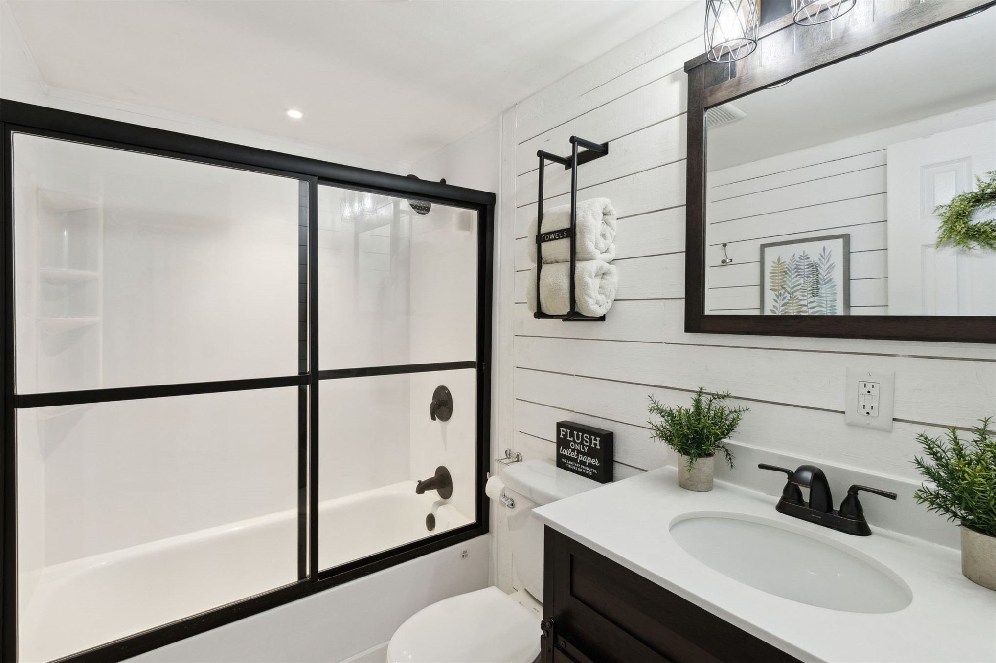 97471 Cutlass Way Yulee, FL 32097 - Photo 13 of 56 a bathroom with a sink toilet and shower